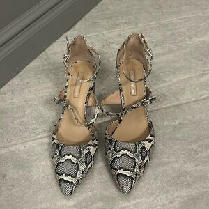 Size 7.5 Antonio milani leopard print shoes.